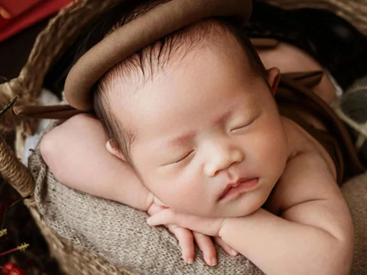 Newborn basket photo retouching before